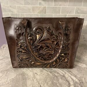 Dark brown tooled leather Patricia Nash